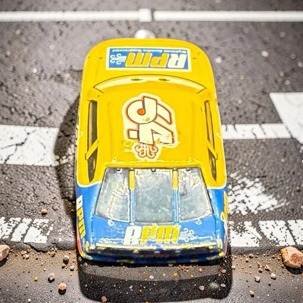 Disney Pixar Cars Winford Bradford Rutherford Yellow Die Cast Race Car A71